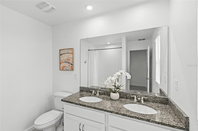 full bathroom with a sink, visible vents, and toilet