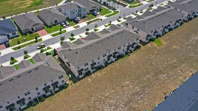 drone / aerial view with a residential view