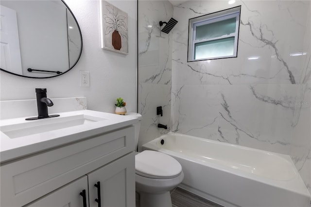 full bath with toilet, vanity, and shower / washtub combination