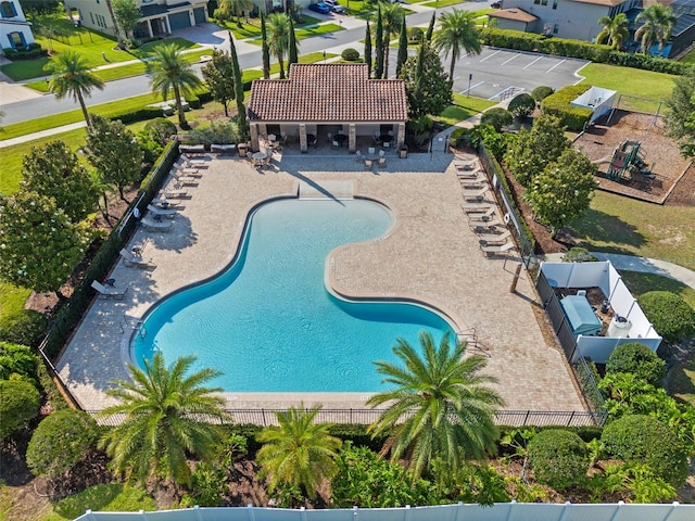 4113 Longbow Dr, Clermont, FL 34711 - community pool featuring fence