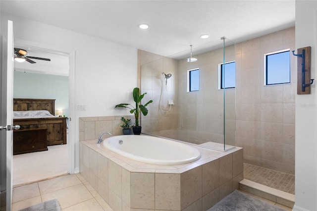 4113 Longbow Dr, Clermont, FL 34711 - ensuite bathroom with a bath, a walk in shower, tile patterned floors, recessed lighting, and a ceiling fan