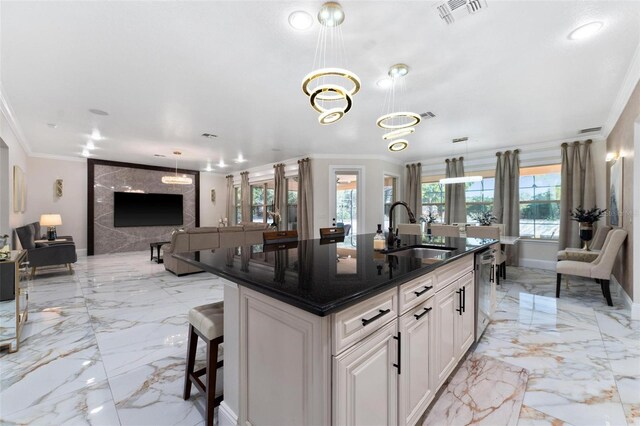 8625 Brixford St, Orlando, FL 32836 - kitchen with crown molding, visible vents, marble finish floor, dishwasher, and a sink