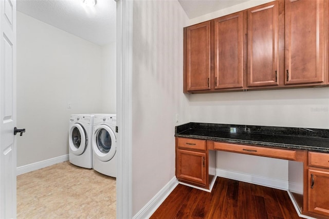 8625 Brixford St, Orlando, FL 32836 - washroom with baseboards, wood finished floors, washing machine and dryer, and laundry area