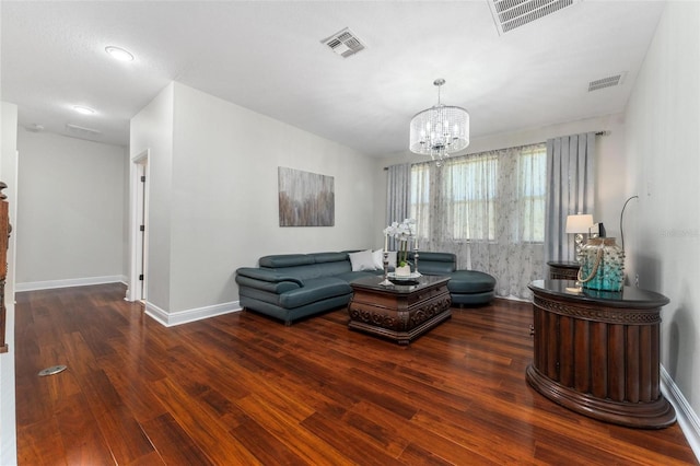8625 Brixford St, Orlando, FL 32836 - living room featuring a chandelier, wood finished floors, and visible vents