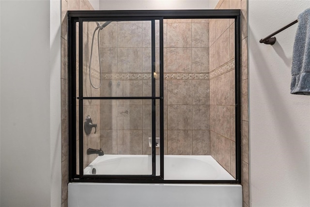 8625 Brixford St, Orlando, FL 32836 - bathroom with bath / shower combo with glass door