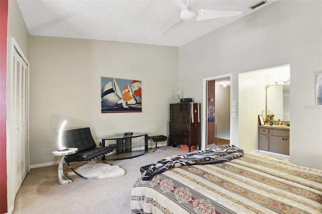 carpeted bedroom featuring visible vents, baseboards, connected bathroom, and ceiling fan