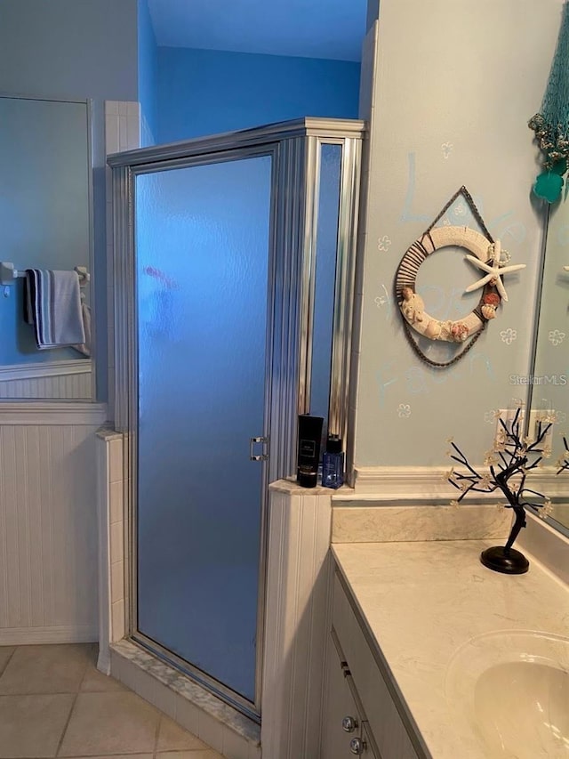 19430 SW 100th Loop, Dunnellon, FL 34432 - full bath featuring a stall shower, vanity, and tile patterned flooring