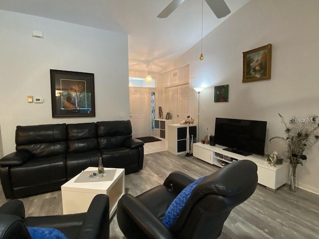 19430 SW 100th Loop, Dunnellon, FL 34432 - living area with wood finished floors, ceiling fan, and baseboards