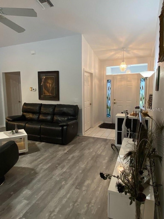 19430 SW 100th Loop, Dunnellon, FL 34432 - living area featuring light wood-style floors and ceiling fan