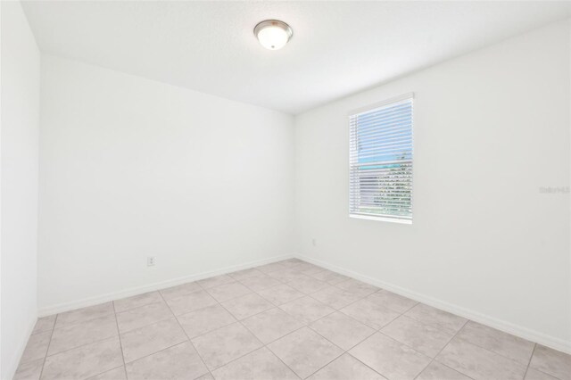 4717 Jasmine Cir, Leesburg, FL 34748 - empty room featuring baseboards
