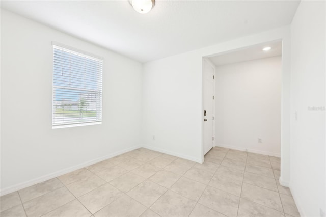 4717 Jasmine Cir, Leesburg, FL 34748 - unfurnished room featuring baseboards and light tile patterned floors