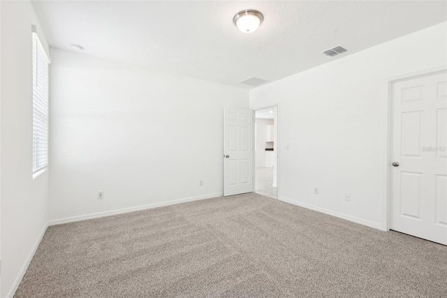4717 Jasmine Cir, Leesburg, FL 34748 - unfurnished bedroom with carpet flooring and baseboards