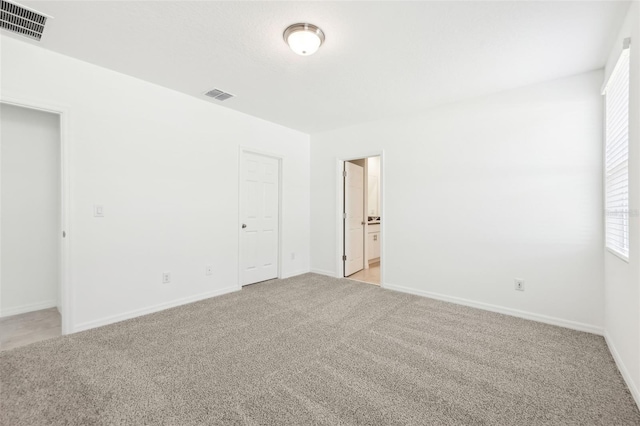 4717 Jasmine Cir, Leesburg, FL 34748 - empty room featuring light carpet and baseboards