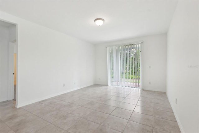 4732 Jasmine Cir, Leesburg, FL 34748 - empty room featuring light tile patterned floors and baseboards