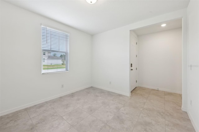 4732 Jasmine Cir, Leesburg, FL 34748 - empty room featuring baseboards, recessed lighting, and light tile patterned flooring