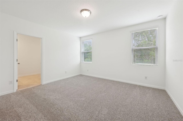4732 Jasmine Cir, Leesburg, FL 34748 - unfurnished room with carpet flooring and baseboards