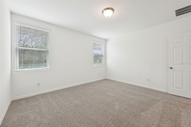 4732 Jasmine Cir, Leesburg, FL 34748 - carpeted empty room with baseboards