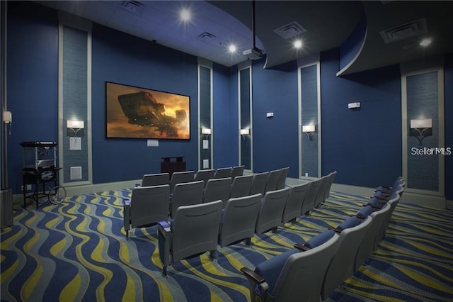 9179 Sommerset Hills Dr, Davenport, FL 33896 - carpeted home theater room featuring baseboards