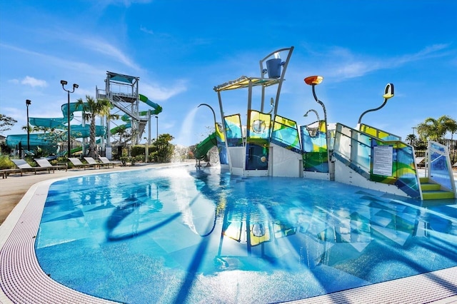 9179 Sommerset Hills Dr, Davenport, FL 33896 - community pool featuring a water play area