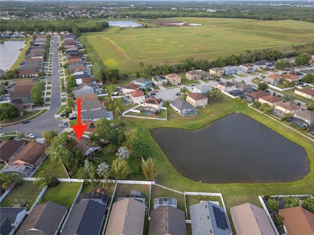 aerial view featuring a water view and a residential view