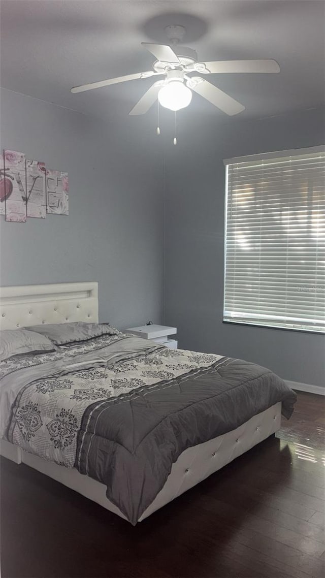 5125 Palm Springs Blvd Unit 13107, Tampa, FL 33647 - bedroom featuring a ceiling fan and wood finished floors