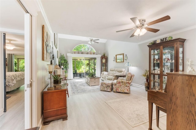 35 Misners Trl, Ormond Beach, FL 32174 - living area with ceiling fan, wood finished floors, healthy amount of natural light, and ornamental molding