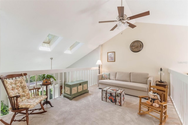 35 Misners Trl, Ormond Beach, FL 32174 - carpeted living room with a ceiling fan, a skylight, and high vaulted ceiling