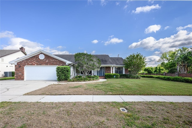 ranch-style home featuring cooling unit, driveway, brick siding, a garage, and a front yard