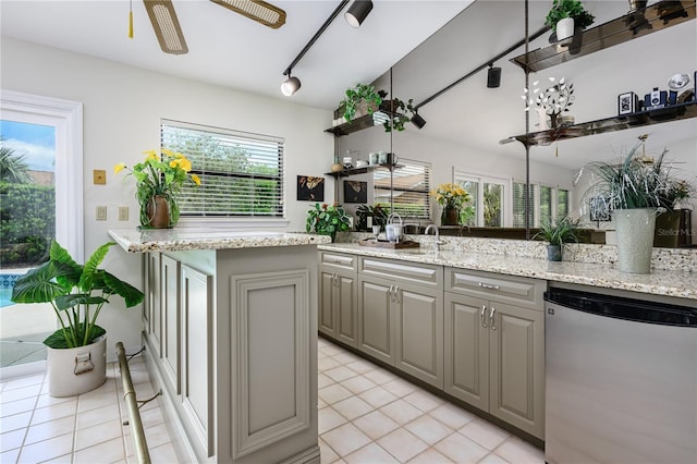 kitchen with dishwasher, gray cabinets, ceiling fan, and light tile patterned floors