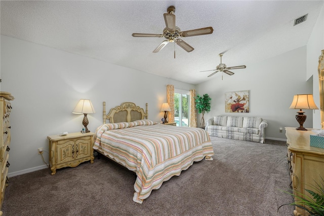 bedroom featuring lofted ceiling, dark colored carpet, visible vents, and baseboards