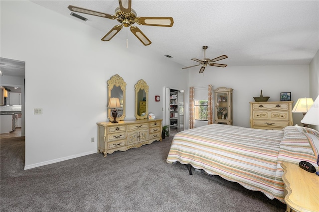 bedroom featuring a ceiling fan, carpet floors, a textured ceiling, and high vaulted ceiling