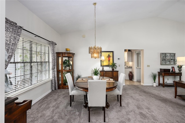 dining space with carpet, baseboards, and a notable chandelier