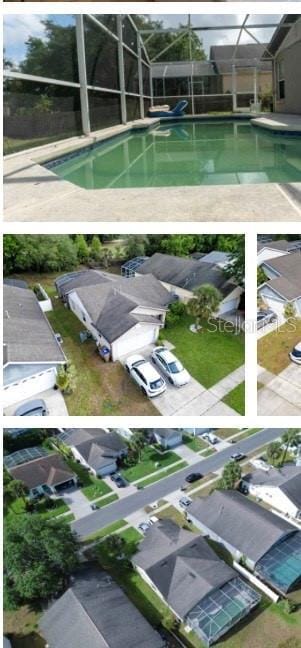view of pool featuring a residential view