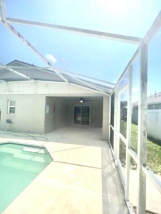pool with a patio