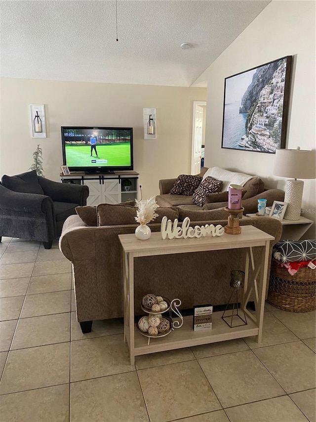 1567 Oak Hill Trl, Kissimmee, FL 34747 - tiled living area featuring a textured ceiling and vaulted ceiling