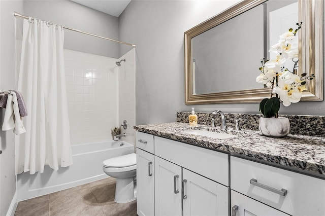 full bathroom with shower / bath combination with curtain, tile patterned floors, vanity, and toilet