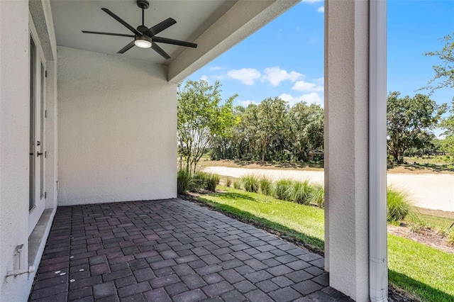 view of patio / terrace featuring ceiling fan