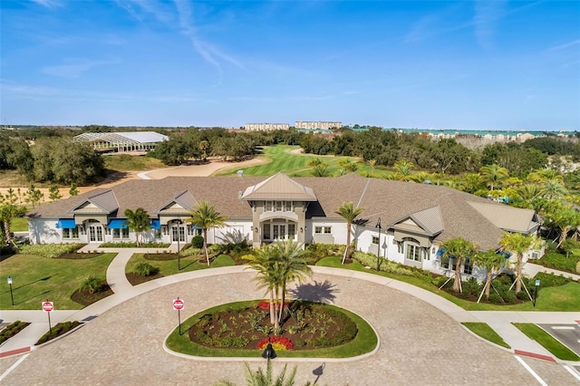 exterior space featuring curved driveway