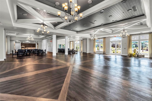workout room featuring visible vents, baseboards, a chandelier, coffered ceiling, and wood finished floors