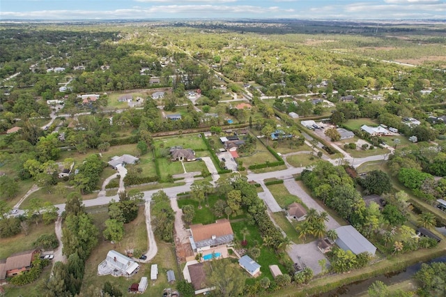 11352 Persimmon Blvd, West Palm Beach, FL 33411 - aerial view of property and surrounding area with a heavily wooded area