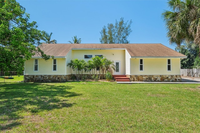 11352 Persimmon Blvd, West Palm Beach, FL 33411 - view of front of house with stone siding and roof with shingles