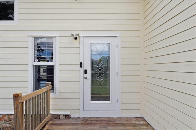 11352 Persimmon Blvd, West Palm Beach, FL 33411 - view of exterior entry with a deck