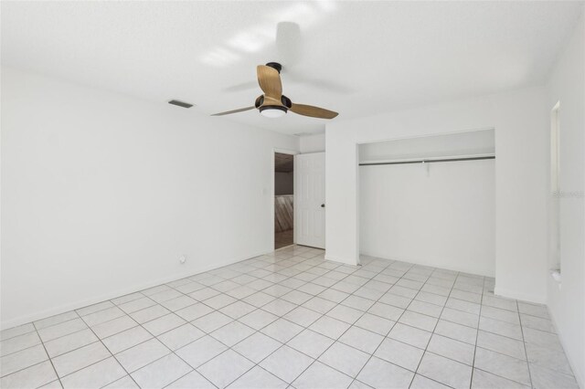 11352 Persimmon Blvd, West Palm Beach, FL 33411 - unfurnished bedroom featuring a closet and a ceiling fan