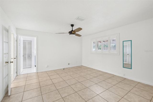 11352 Persimmon Blvd, West Palm Beach, FL 33411 - empty room featuring a ceiling fan and light tile patterned floors