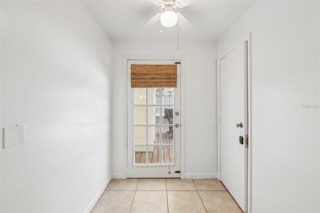 11352 Persimmon Blvd, West Palm Beach, FL 33411 - spare room with baseboards, light tile patterned floors, and ceiling fan