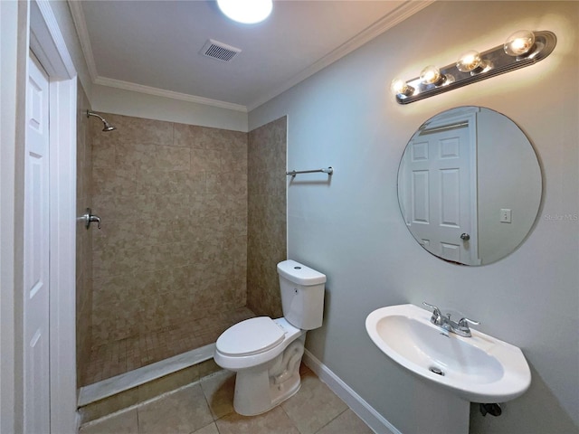 5126 Picadilly Circus Ct Unit 11, Orlando, FL 32839 - full bath with tile patterned flooring, toilet, tiled shower, visible vents, and a sink