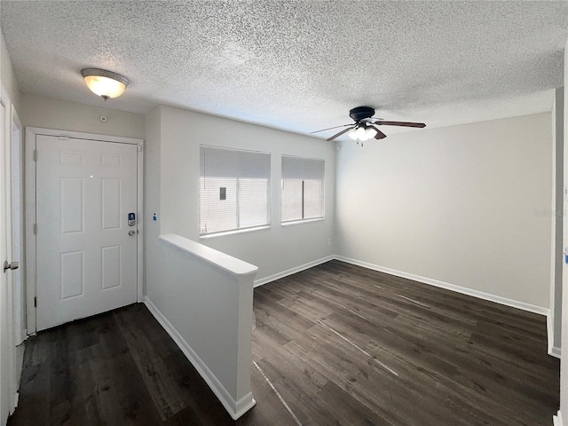 5126 Picadilly Circus Ct Unit 11, Orlando, FL 32839 - foyer with a textured ceiling, dark wood finished floors, baseboards, and a ceiling fan