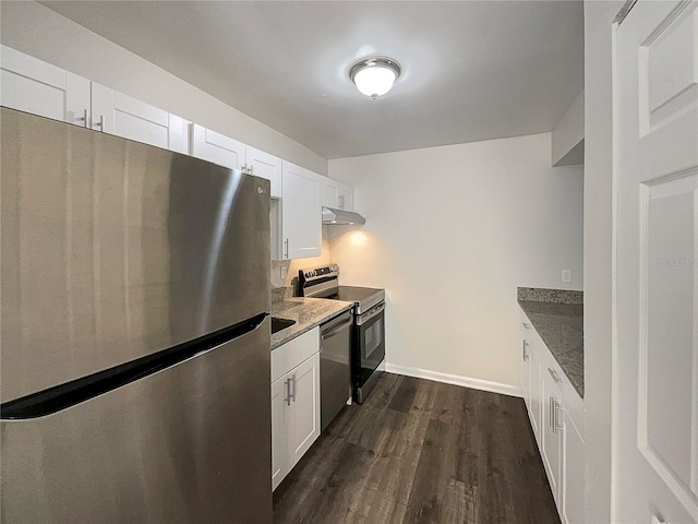 5126 Picadilly Circus Ct Unit 11, Orlando, FL 32839 - kitchen with white cabinets, under cabinet range hood, stainless steel appliances, baseboards, and dark wood-style floors
