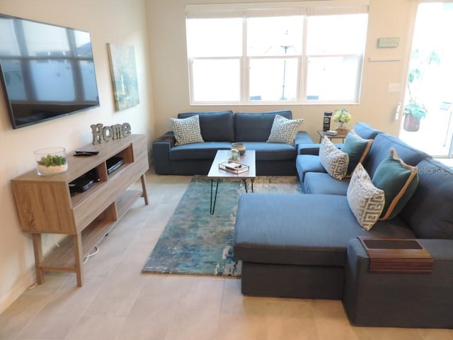 living area featuring tile patterned flooring