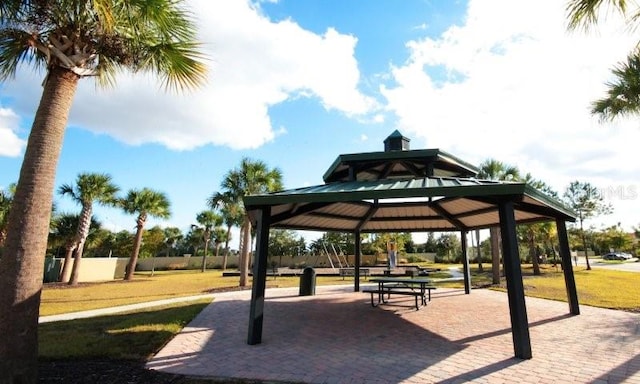 view of community featuring a gazebo and a lawn